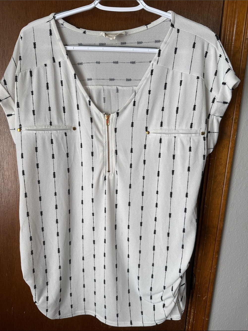 Black and white arrow maternity dress shirt with gold accents